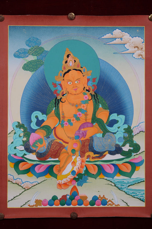 Unveil a world of abundance with this mesmerizing hand-painted Jambhala thangka, a masterpiece meticulously crafted by skilled artisans nestled in the serene Himalayan mountains. This luminous artwork showcases Jambhala, the revered Buddhist deity of wealth and prosperity, in his full glory.