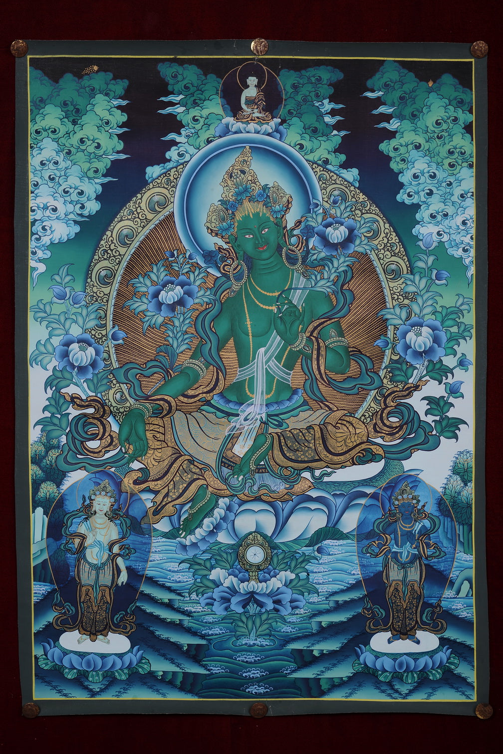 Embrace the transformative energy of Green Tara with this captivating thangka, meticulously hand-painted by skilled artisans in the heart of the Himalayas.
