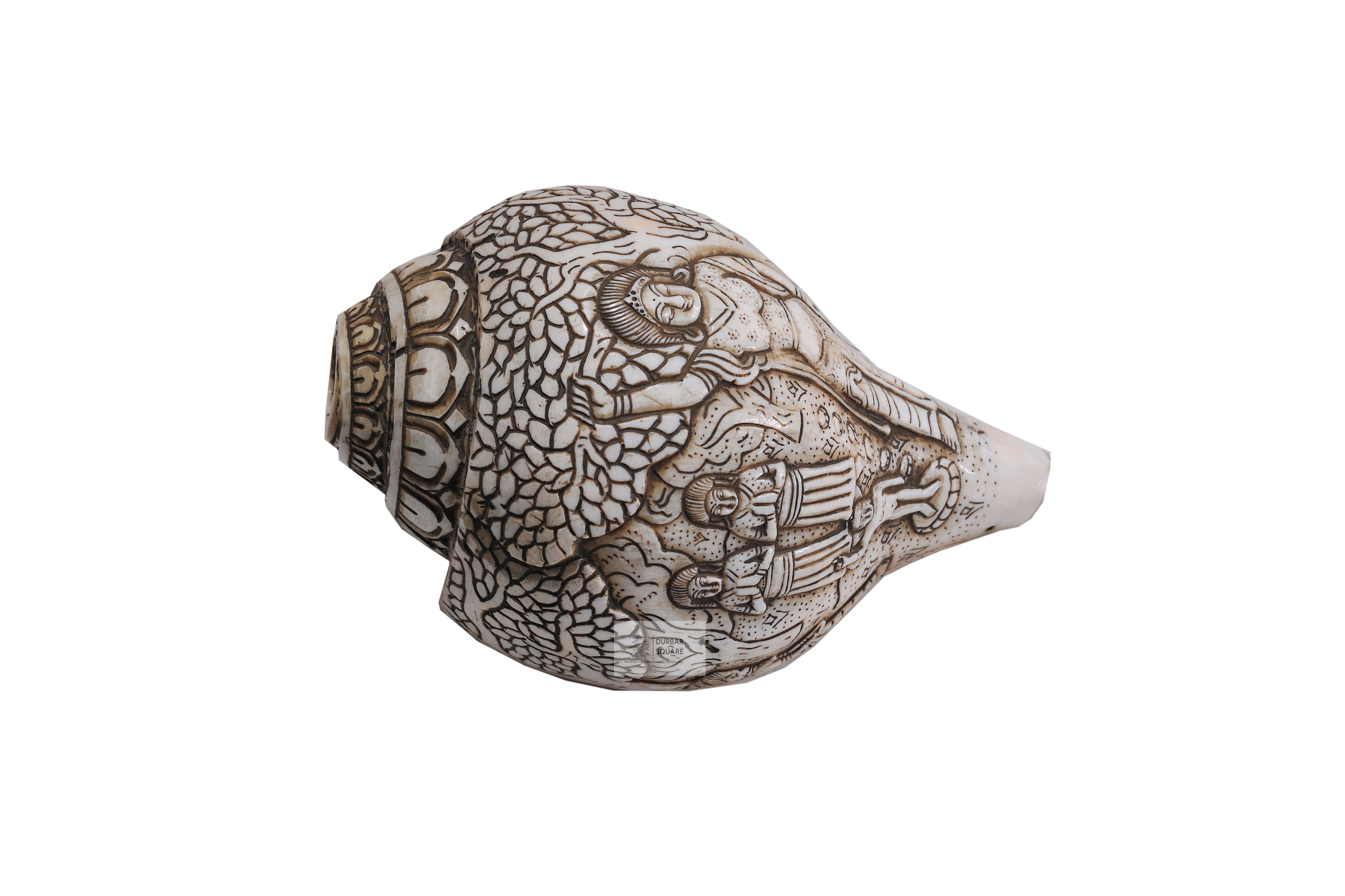 Natural white conch shell hand-carved in relief with deity figures