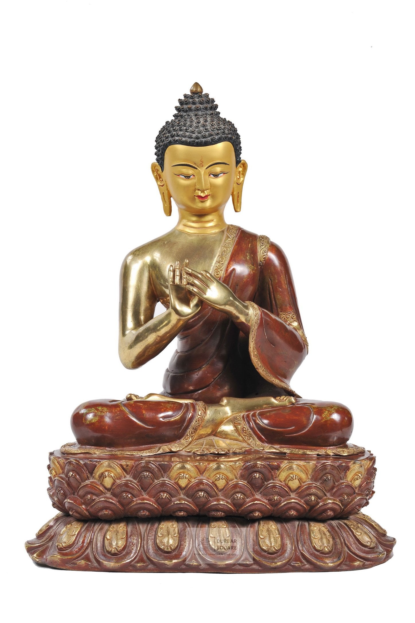 Gold-plated copper Buddha statue seated on a lotus throne with both hands raised at the chest in the dharmachakra teaching gesture