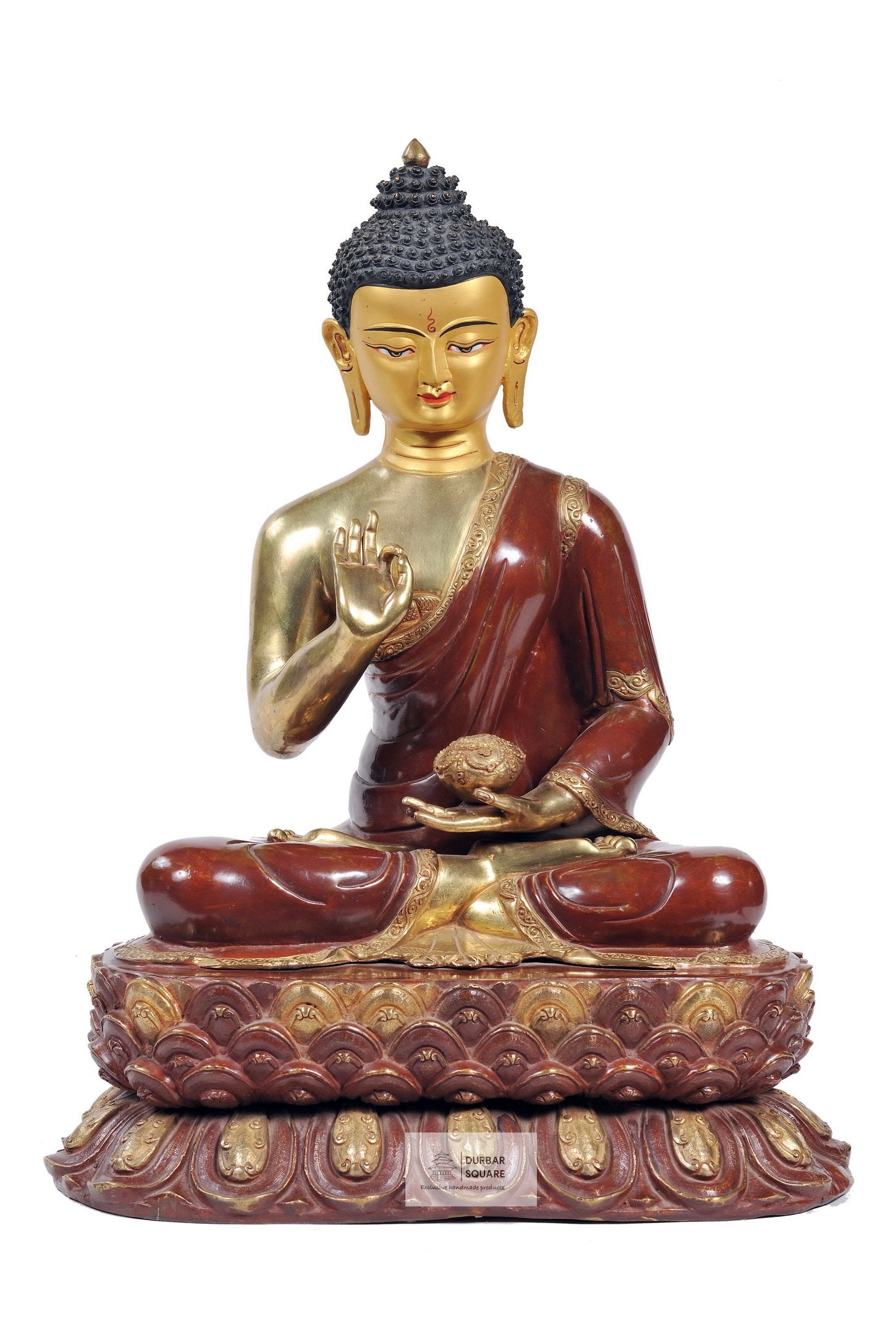 Gold-plated copper Buddha statue seated on a lotus throne, right hand raised palm outward in the vitarka discussion gesture