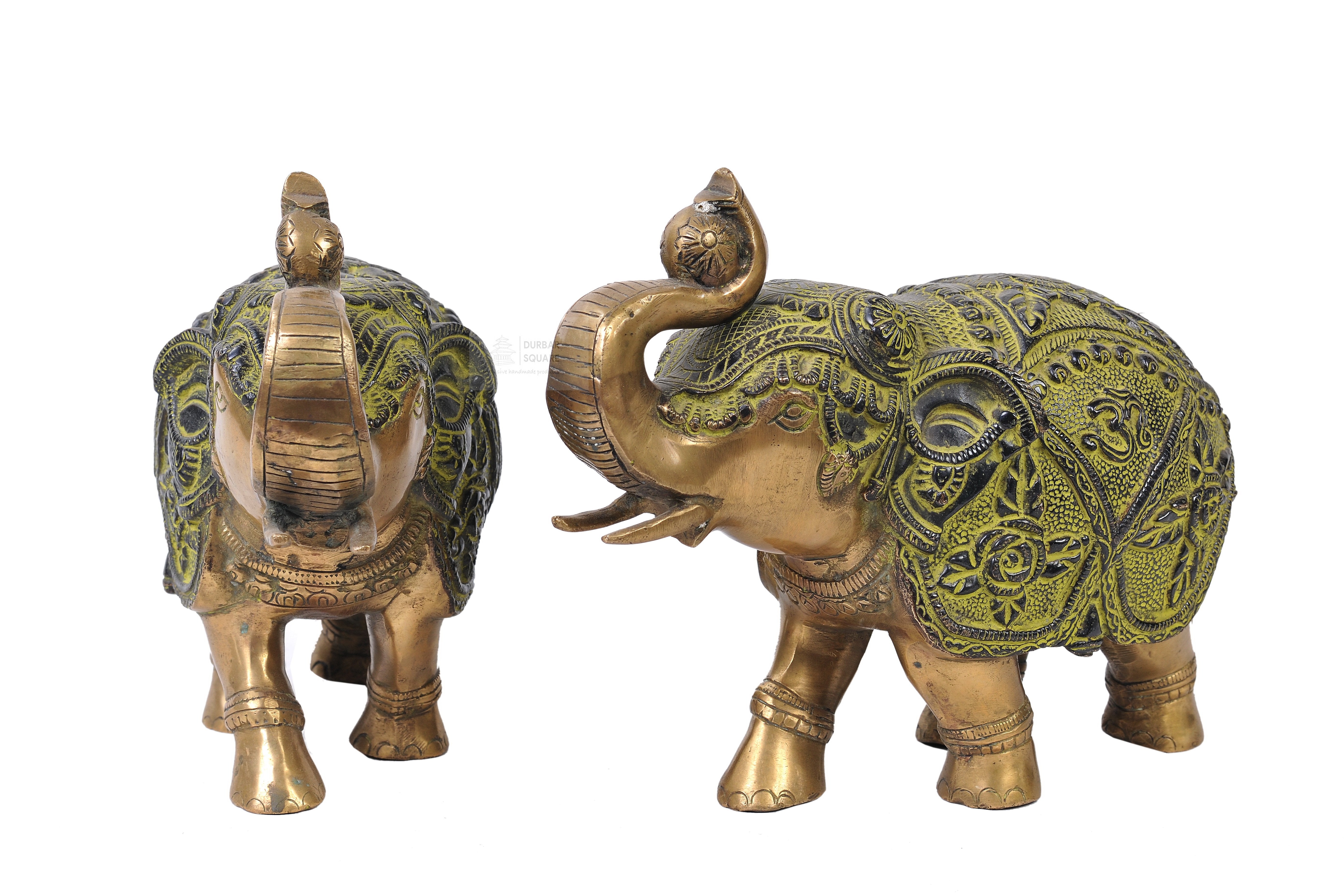 Pair of antique-finish bronze elephant figurines with ornate engraved caparisons, one with trunk raised