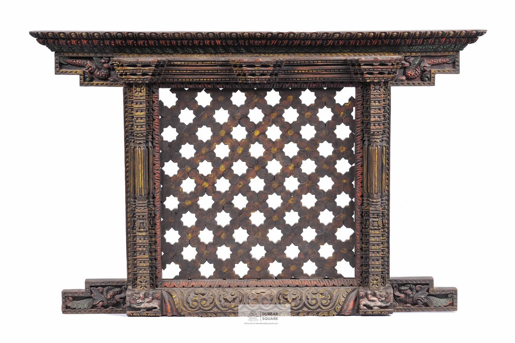 Large carved wooden Ankhi Jhyal lattice window with painted and gilded detail